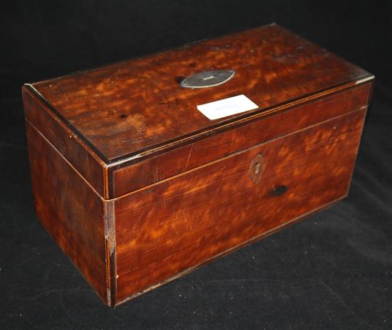A tea caddy and contents